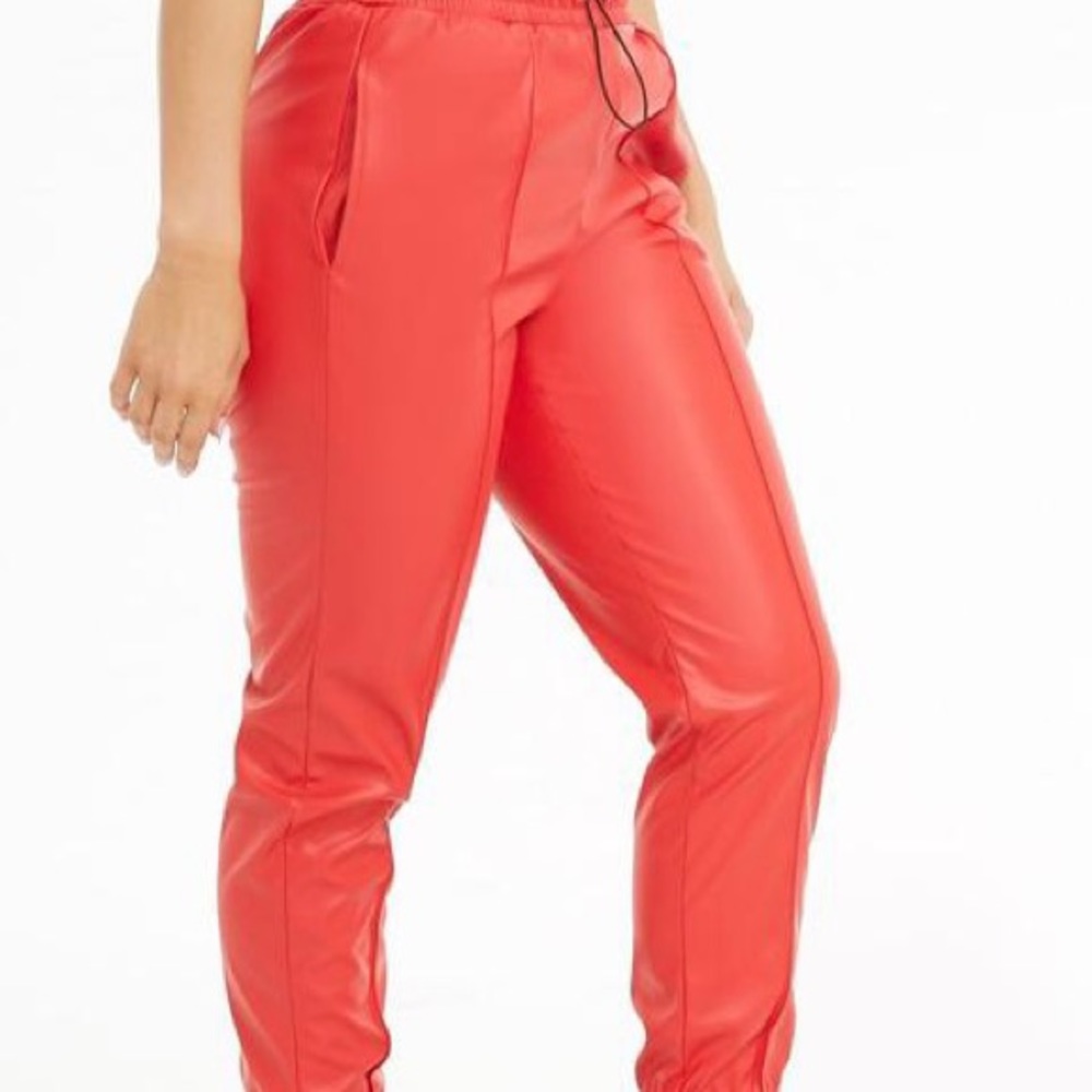 Red faux leather joggers